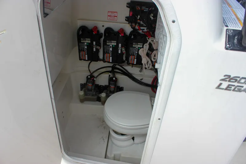 Slide: The Image of 2017 NauticStar 2602 Legacy boat engine controls and wiring panel. - 40
