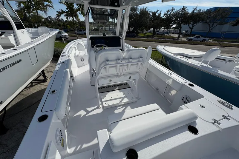 Slide: The Image of 2026 Sportsman Open 232 Center Console boat interior with seating and console view. - 3