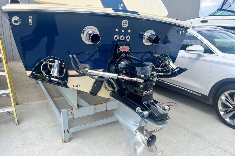 Slide: The Image of 1986 Donzi Hornet III boat with powerful engine and sleek design on display. - 5