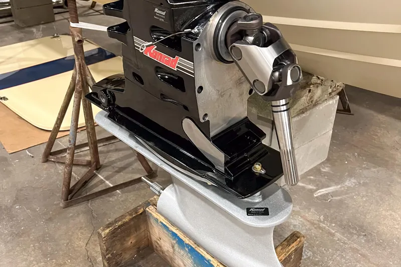 Slide: The Image of 1986 Donzi Hornet III boat engine component in a workshop setting. - 6