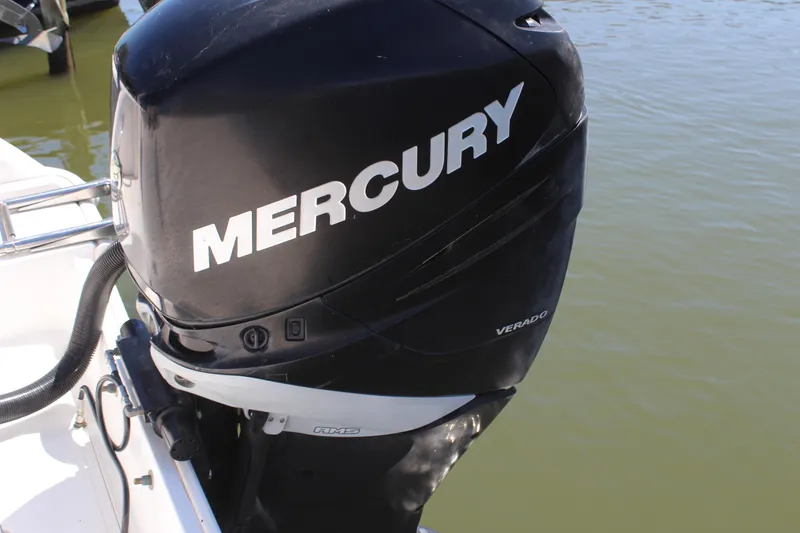 Slide: The Image of Mercury Verado outboard motor on 2009 Boston Whaler 220 Outrage boat. - 4