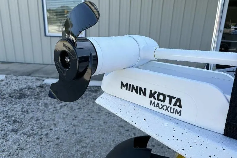 Slide: The Image of Minn Kota Maxxum motor on 2026 Xpress H20B Bay boat, close-up view. - 3