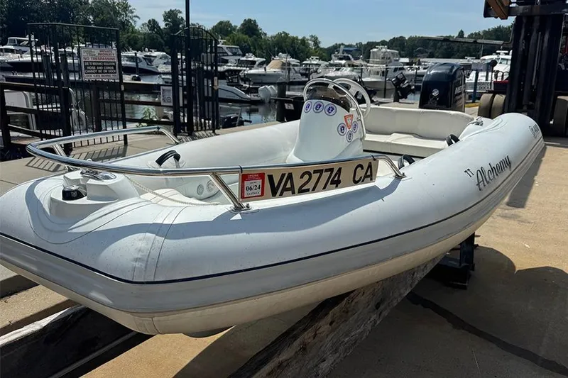 The Image of 2017 Mercury Inflatables M 400 HP boat docked at a marina. - 0