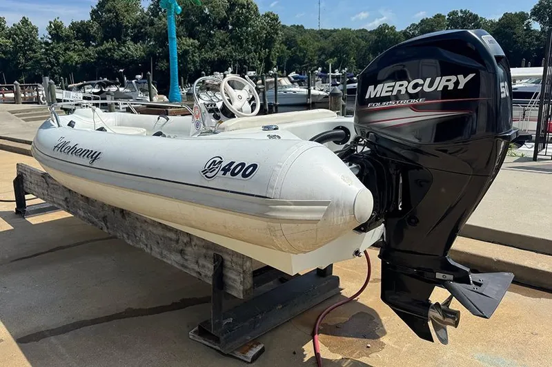 Slide: The Image of 2017 Mercury Inflatables M 400 HP boat with Mercury FourStroke engine at marina. - 5