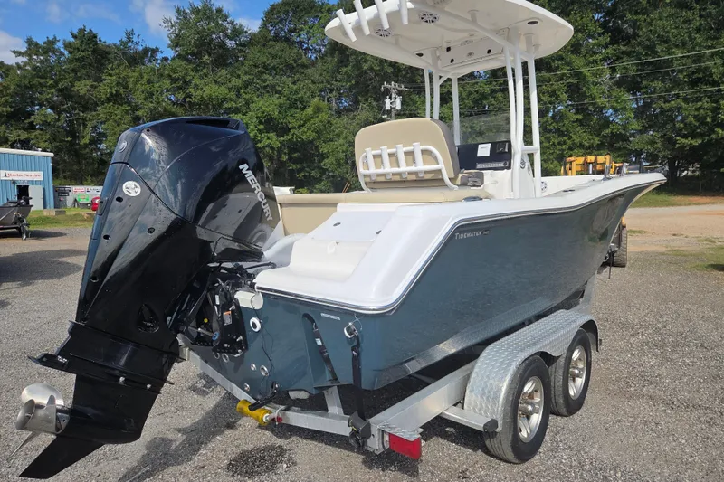 Slide: The Image of 2021 Tidewater 220 LXF boat with Mercury outboard engine on a trailer. - 4