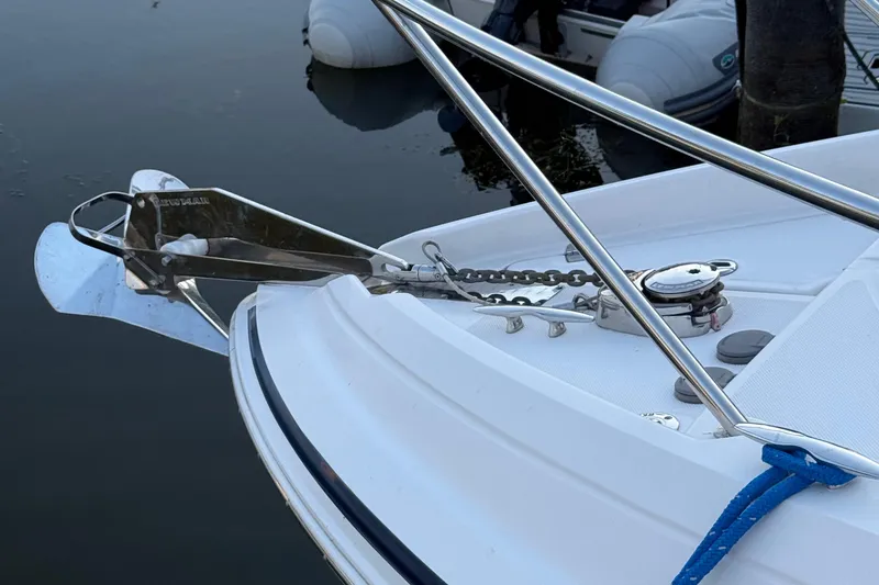 Slide: The Image of Bow of 2018 Regal 28 Express boat with anchor and chain. - 11
