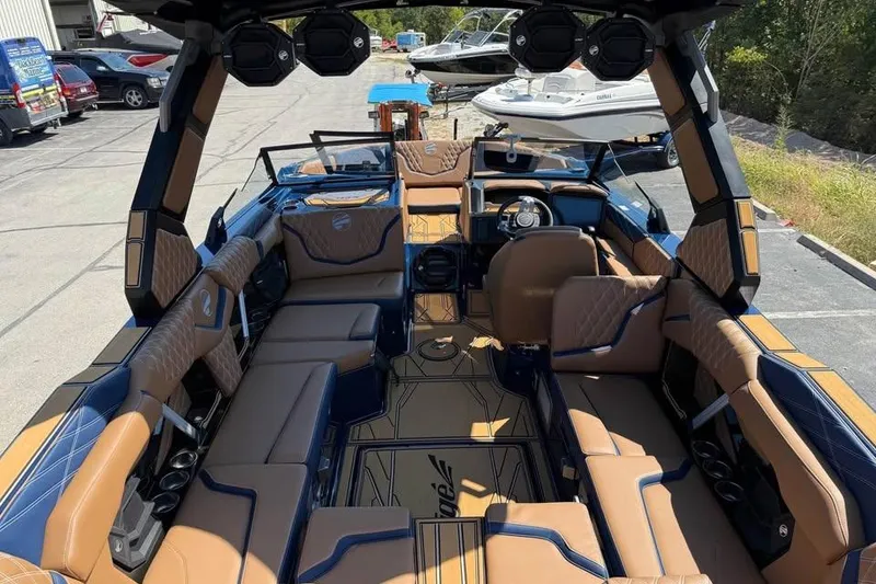 Slide: The Image of Luxurious interior of 2026 Tigé 24RZX boat with spacious seating and modern design. - 10