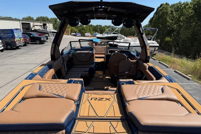 Slide: The Image of 2026 Tigé 24RZX boat interior with luxurious seating and modern design. - 7