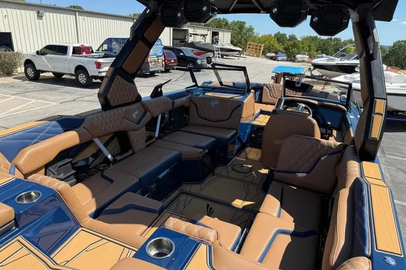 Slide: The Image of 2026 Tigé 24RZX boat interior with luxurious seating and modern design. - 9