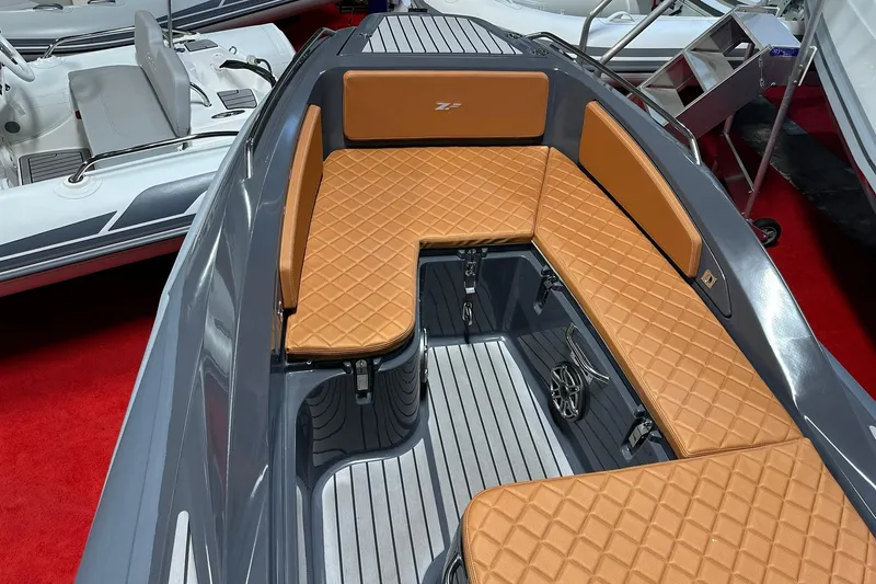 Slide: The Image of Luxurious 2025 Zar Formenti 59 SL/Limited boat with elegant tan seating and sleek design. - 8