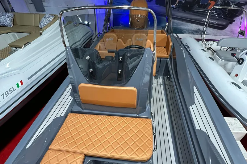 Slide: The Image of 2025 Zar Formenti 59 SL/Limited boat interior with tan leather seating and sleek design. - 9