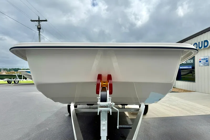 Slide: The Image of 2026 Carolina Skiff E21 DLX Kit Boat on trailer, outdoor display. - 7