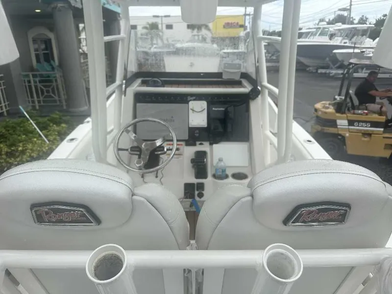 Slide: The Image of 2019 Ranger 2510 Bay Ranger boat interior with steering wheel and controls. - 8
