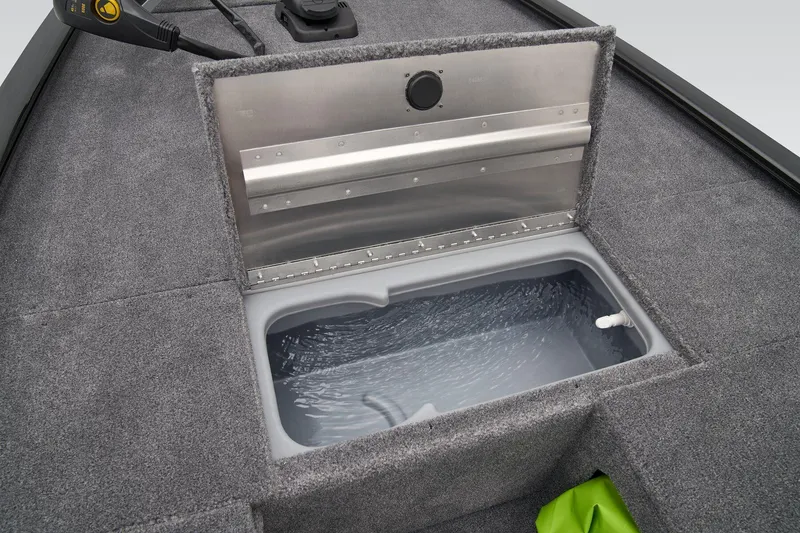 Slide: The Image of Manufacturer Provided Image: 2026 Tracker Pro 170 boat livewell with open lid, showcasing interior water storage. - 18