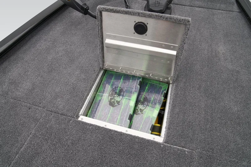 Slide: The Image of Manufacturer Provided Image: 2026 Tracker Pro 170 boat storage compartment with batteries visible. - 19