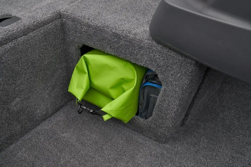 Slide: The Image of Manufacturer Provided Image: Storage compartment in 2026 Tracker Pro 170 boat with green bag inside. - 34