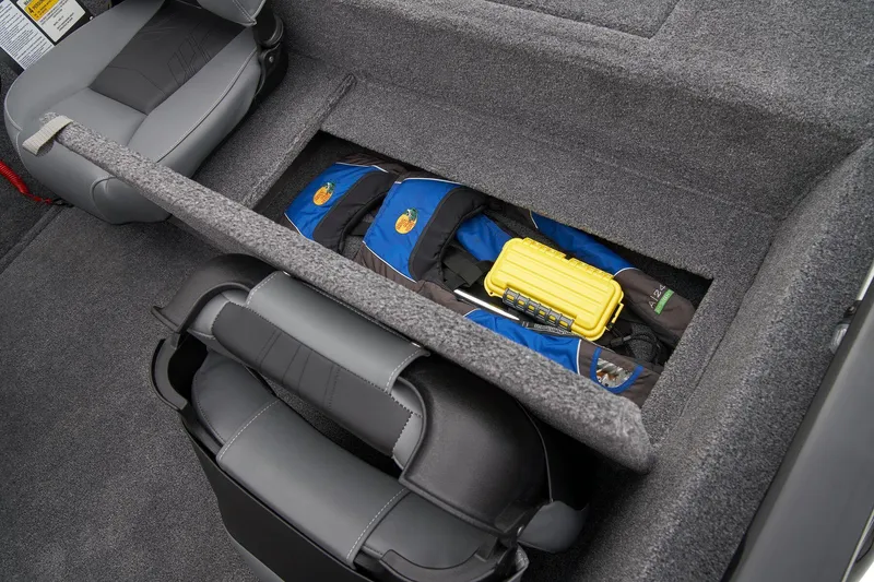 Slide: The Image of Manufacturer Provided Image: Storage compartment in 2026 Tracker Pro 170 boat with life jackets and gear. - 36