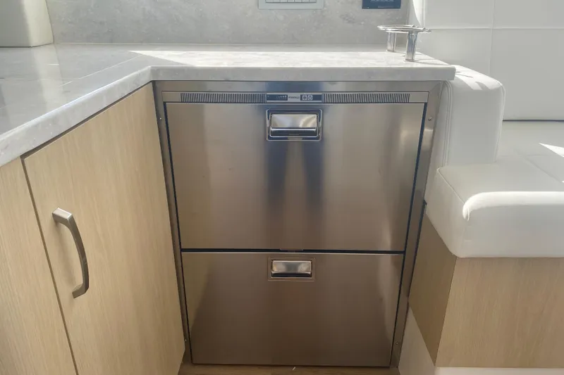 Slide: The Image of Modern sink and countertop on 2023 Regal 38 Grande Coupe yacht. - 13