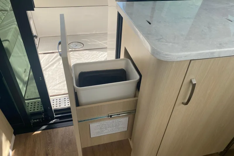 Slide: The Image of Stainless steel drawer fridge in 2023 Regal 38 Grande Coupe yacht interior. - 14