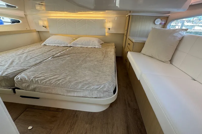 Slide: The Image of Luxurious bathroom interior of 2023 Regal 38 Grande Coupe yacht, featuring modern sink and mirror. - 24