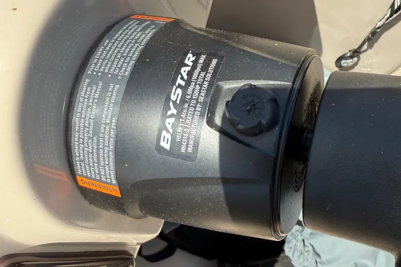 Slide: The Image of BayStar hydraulic steering system on 2016 Sylvan Mirage Fish 8520 4-PT boat. - 16