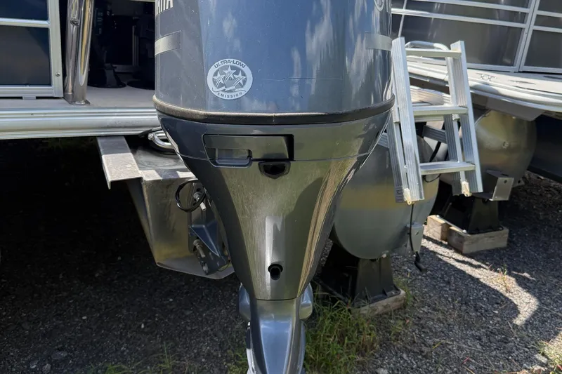 Slide: The Image of 2016 Sylvan Mirage Fish 8520 4-PT boat with Yamaha outboard motor and ladder. - 2