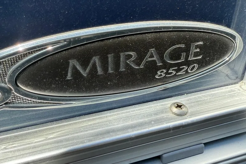 Slide: The Image of 2016 Sylvan Mirage Fish 8520 4-PT emblem on a metallic surface. - 29