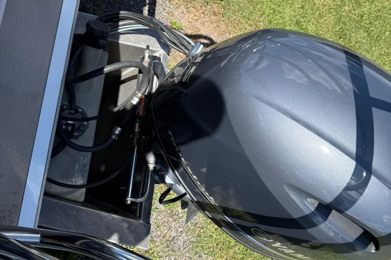 Slide: The Image of 2016 Sylvan Mirage Fish 8520 4-PT boat engine, top view, showing cables and components. - 5