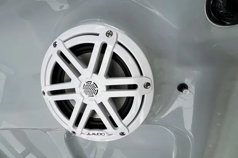 Slide: The Image of White JL Audio speaker on 2025 Sea Hunt BX 25 FS boat. - 22