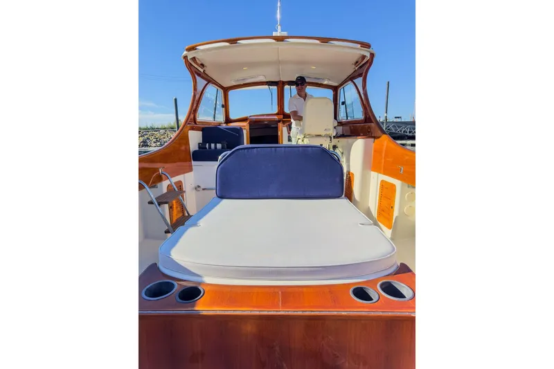 Slide: The Image of 2001 Hinckley Yachts Picnic Boat Classic 36 with spacious deck and seating area. - 12