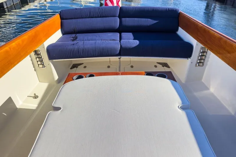 Slide: The Image of Hinckley Yachts Picnic Boat Classic 36, 2001, featuring elegant seating and wooden accents. - 14