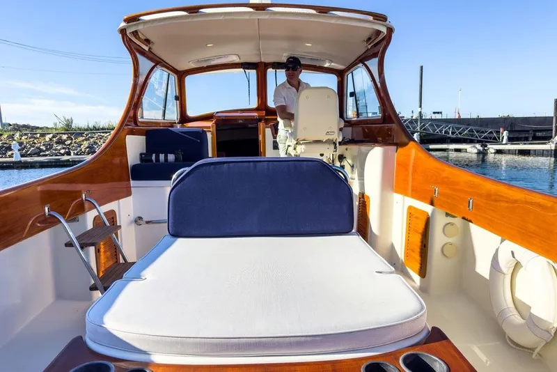 Slide: The Image of 2001 Hinckley Yachts Picnic Boat Classic 36 with elegant wooden interior and spacious deck. - 15