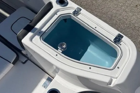 Slide: The Image of 2026 Yamaha Boats 255 FSH Sport H livewell, featuring sleek design and functionality. - 33