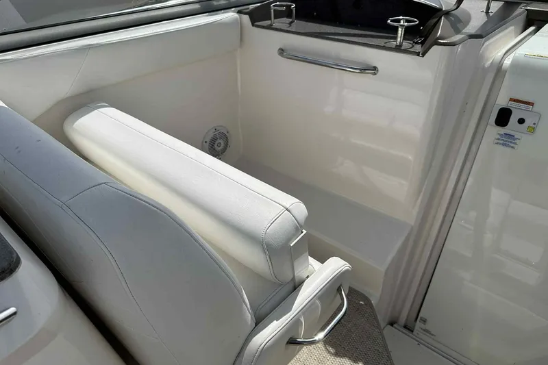 Slide: The Image of 2005 Regal 3350 Sport Cruiser interior with white seating and sleek design. - 15
