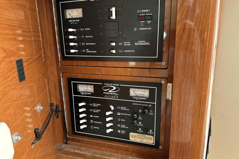 Slide: The Image of Control panel of a 2005 Regal 3350 Sport Cruiser with wood finish. - 20