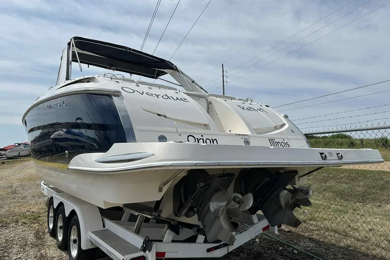 Slide: The Image of 2005 Regal 3350 Sport Cruiser on trailer, rear view, outdoors. - 27