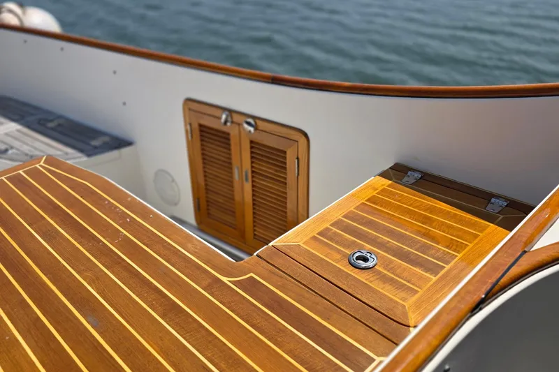 Slide: The Image of Teak deck of 2006 Nordic Star 33 Runabout boat with wooden accents. - 12
