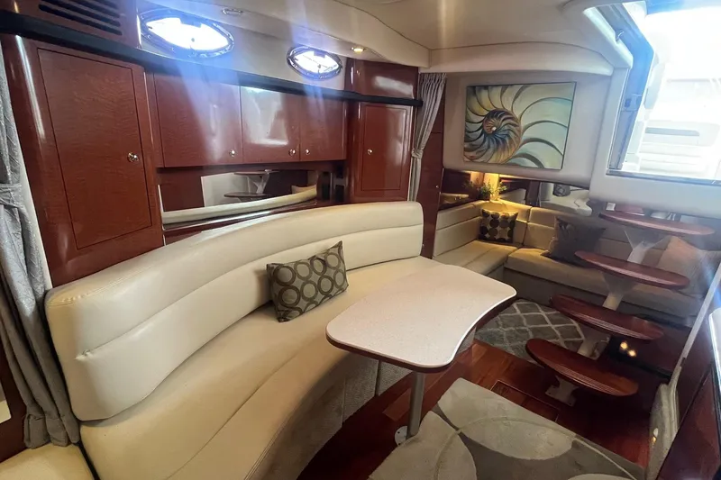 Slide: The Image of Luxurious 2004 Sea Ray 340 Sundancer cabin interior with elegant seating and stylish decor. - 26
