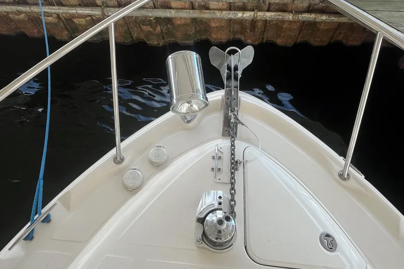 Slide: The Image of Bow of 2004 Sea Ray 340 Sundancer with anchor and chain mechanism. - 6
