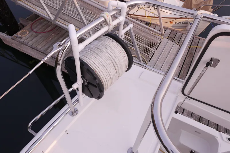 Slide: The Image of Deck view of 2013 American Tug 395 with coiled rope on railing. - 112