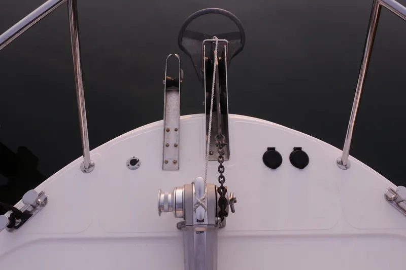 Slide: The Image of Bow view of 2013 American Tug 395 with anchor winch and railing. - 115