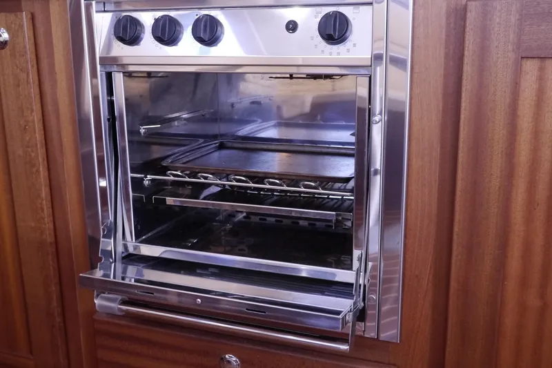 Slide: The Image of Stainless steel oven in 2013 American Tug 395 yacht kitchen. - 26
