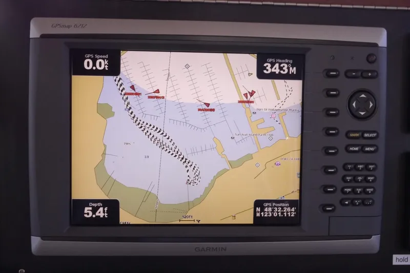 Slide: The Image of Garmin GPS display on 2013 American Tug 395, showing navigation map and data. - 45
