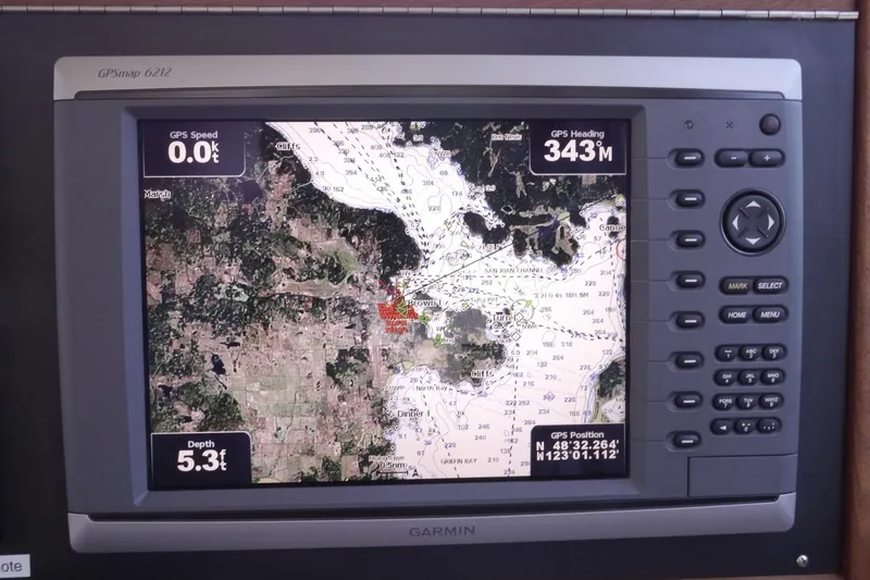 Slide: The Image of Garmin GPSmap 6212 on 2013 American Tug 395 displaying navigation chart. - 46