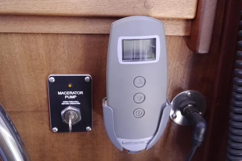 Slide: The Image of Control panel on 2013 American Tug 395 with macerator pump and Lofrans control. - 48