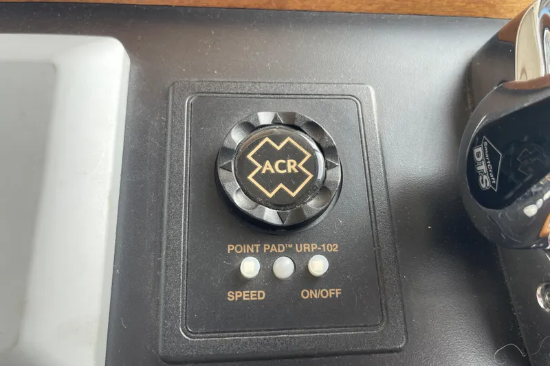 Slide: The Image of Control panel of a 2013 American Tug 395 with ACR Point Pad URP-102. - 52