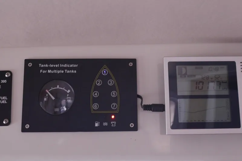 Slide: The Image of Tank-level indicator and display panel on 2013 American Tug 395 boat. - 56