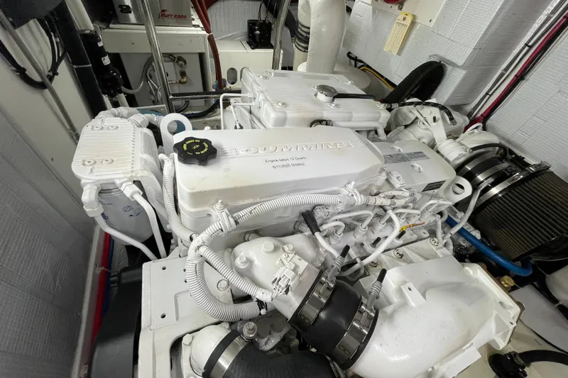 Slide: The Image of Engine room of a 2013 American Tug 395 with a Cummins marine engine. - 64