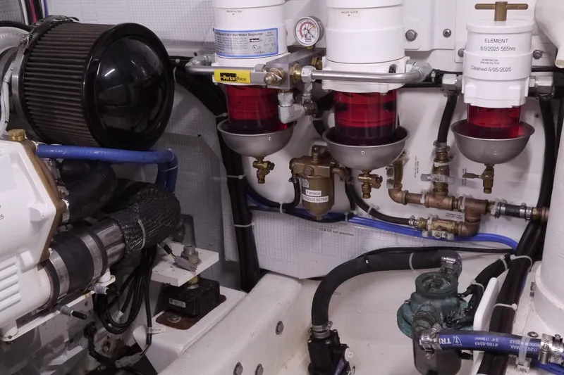 Slide: The Image of Engine room of 2013 American Tug 395 with fuel filters and hoses. - 78