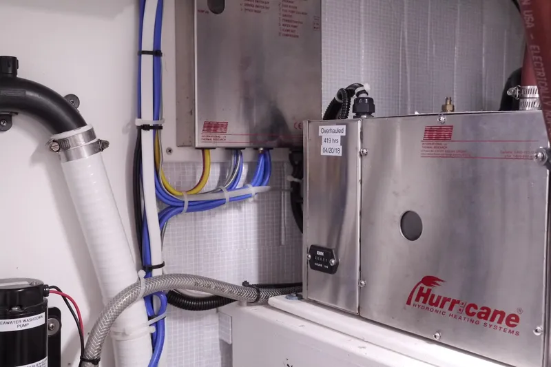 Slide: The Image of Engine room of 2013 American Tug 395 with Hurricane hydronic heating system. - 80